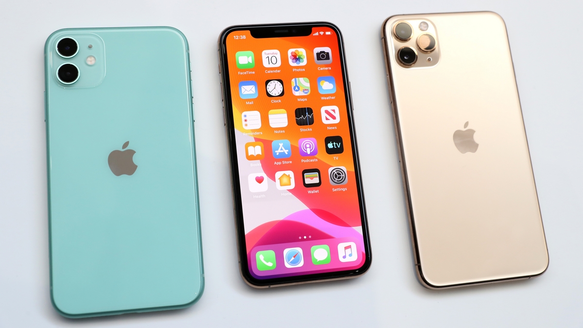 The new Apple iPhone 11 (L) and iPhone 11 Pro (R) are displayed during a special event on September 10, 2019