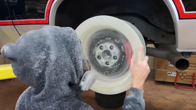 Watch This Guy’s Homemade Epoxy Wheel Survive An Incredible Driveway Burnout