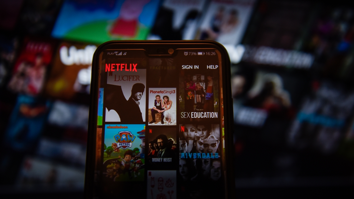 In this photo illustration a Netflix app displayed on a
