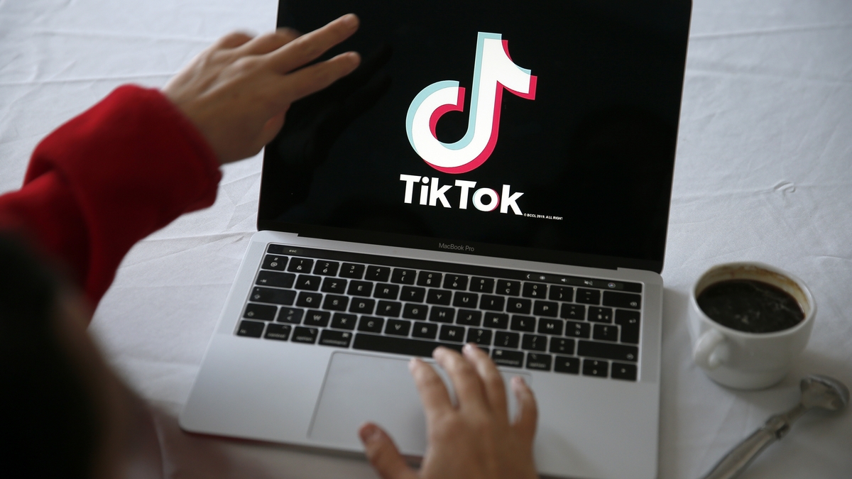 tiktok huawei the logo of Chinese media app for creating and sharing short videos TikTok, also known as Douyin is displayed on the screen of an apple macbook pro computer
