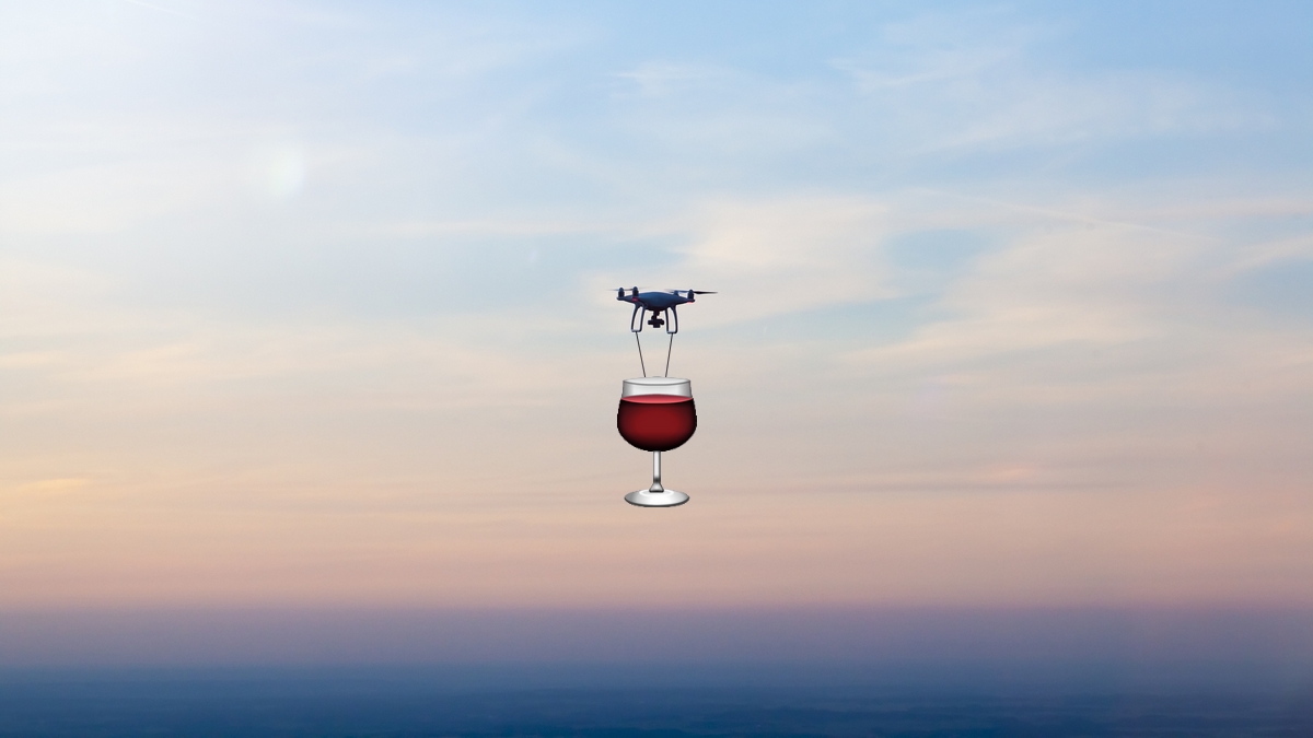 Flying drone with camera plus wine.