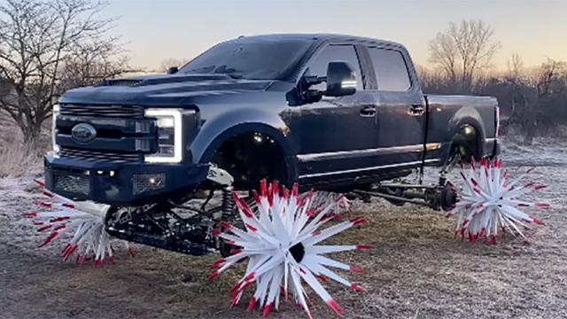 Putting Huge Spikes On Your Ford F-350 Instead Of Wheels Won’t Help It Plough A Field