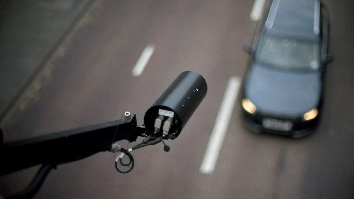 CCTV pointing on car - view from above, blurred background
