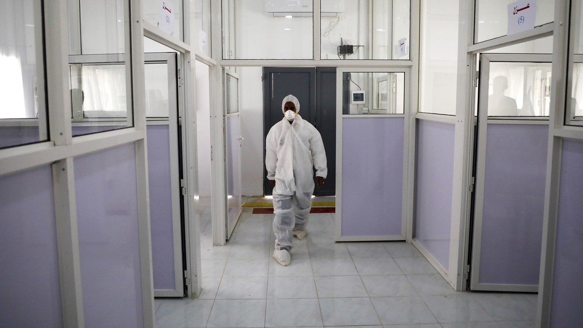 A health worker makes final preparations at a newly-built coronavirus quarantine center on March 02, 2020 in Sana'a, Yemen. So far, no cases of the novel coronavirus have been recorded in Yemen