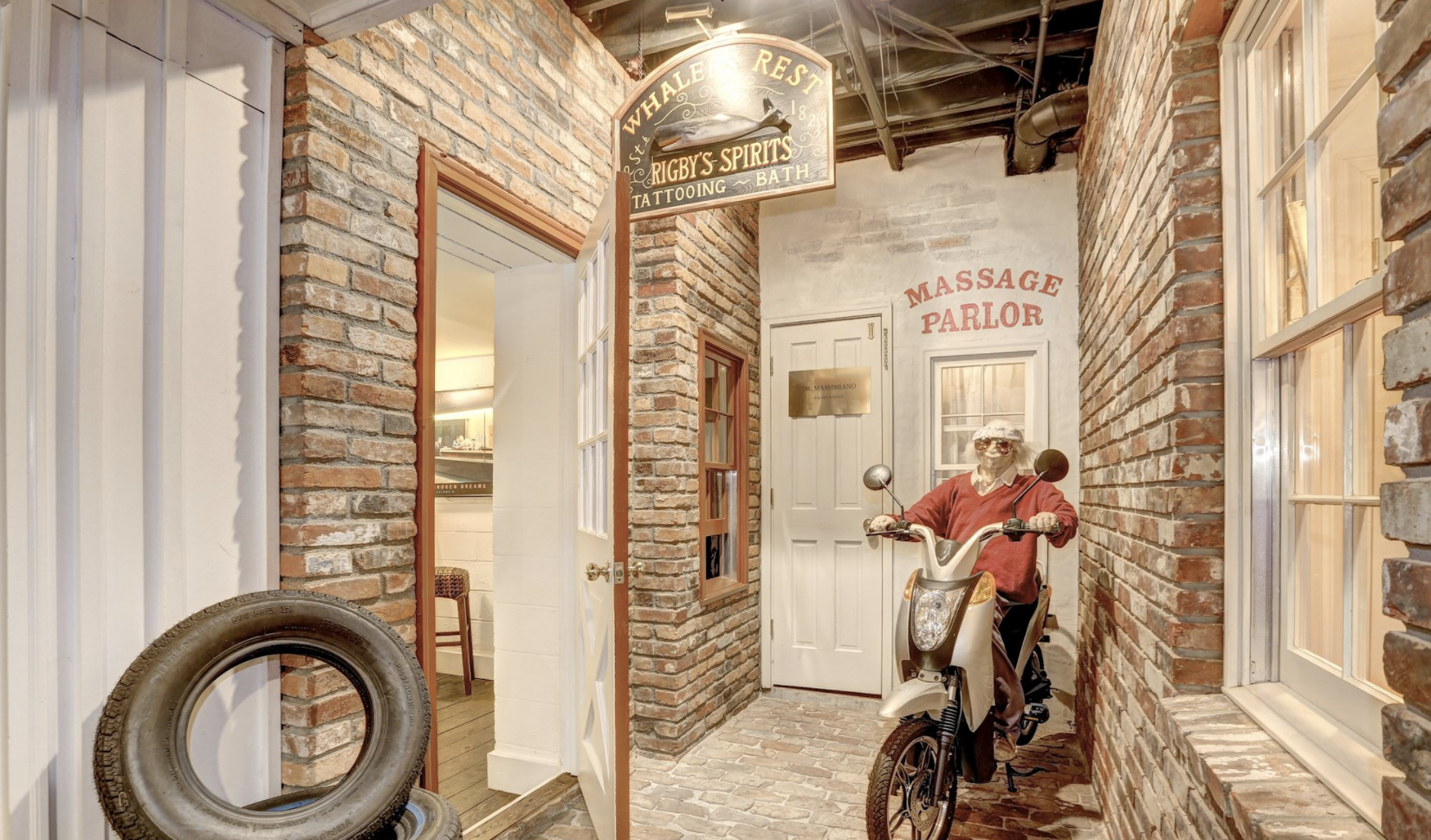 There’s A Life-Sized Fake Town Complete With Real Cars In This Mansion’s Basement