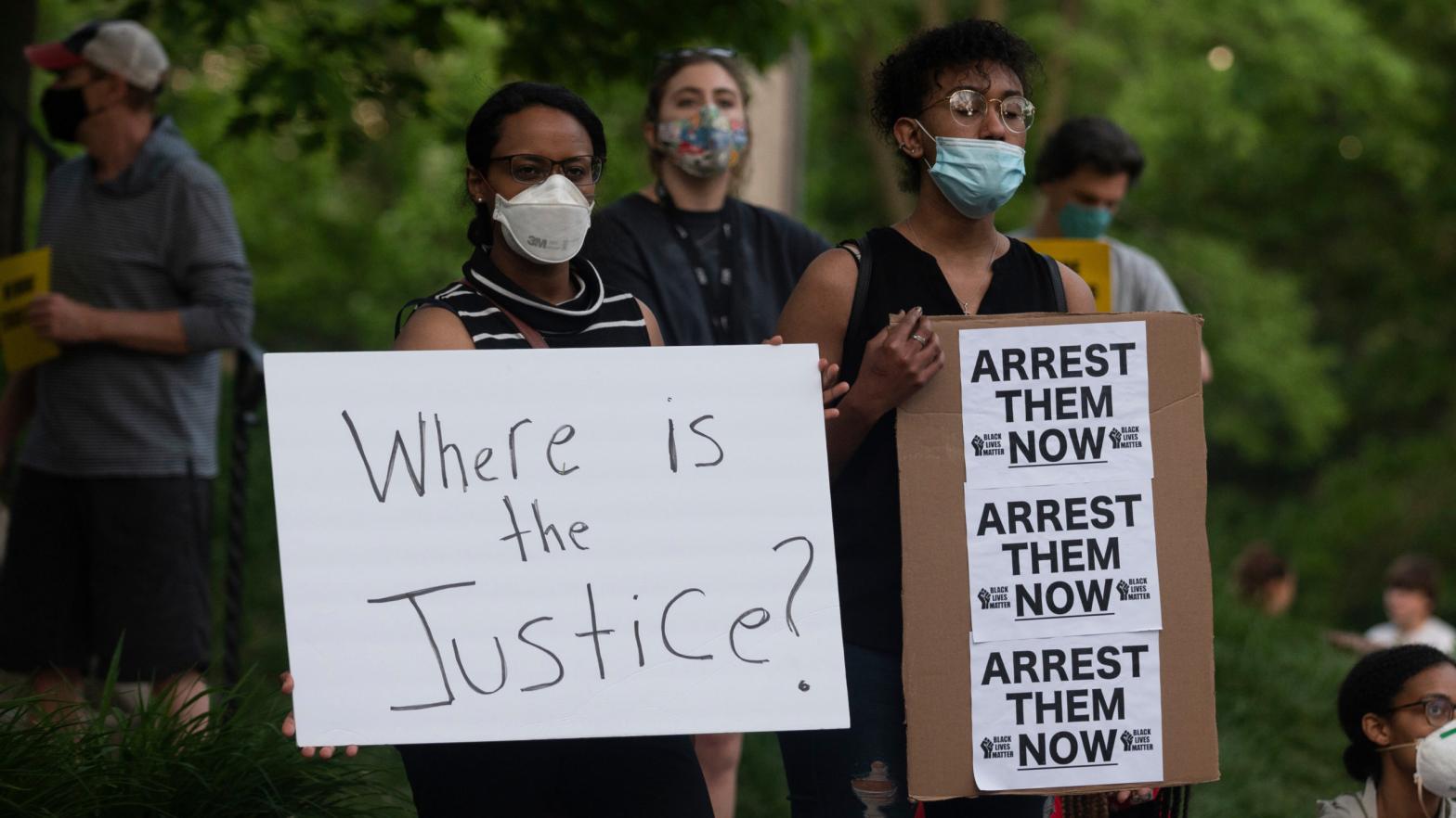 A group of protesters gather outside the home of Hennepin County Attorney Mike Freeman on May 28, 2020 in Minneapolis, Minnesota.  (Photo: Getty Images)