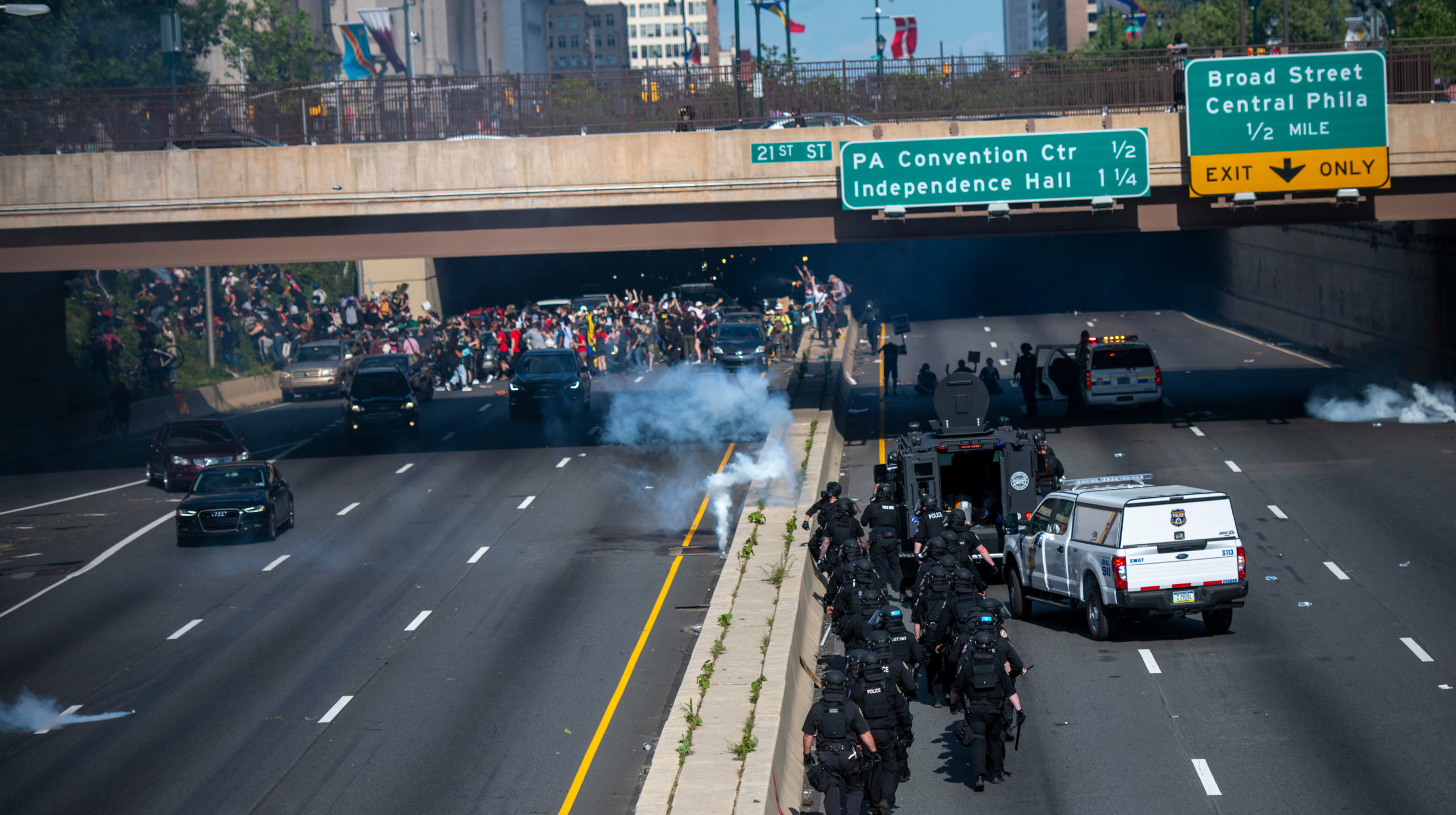 Protesters scramble in Centre City, Philadelphia after police launched tear gas at them near a tunnel exit. (Photo: Mark Makela, Getty Images)