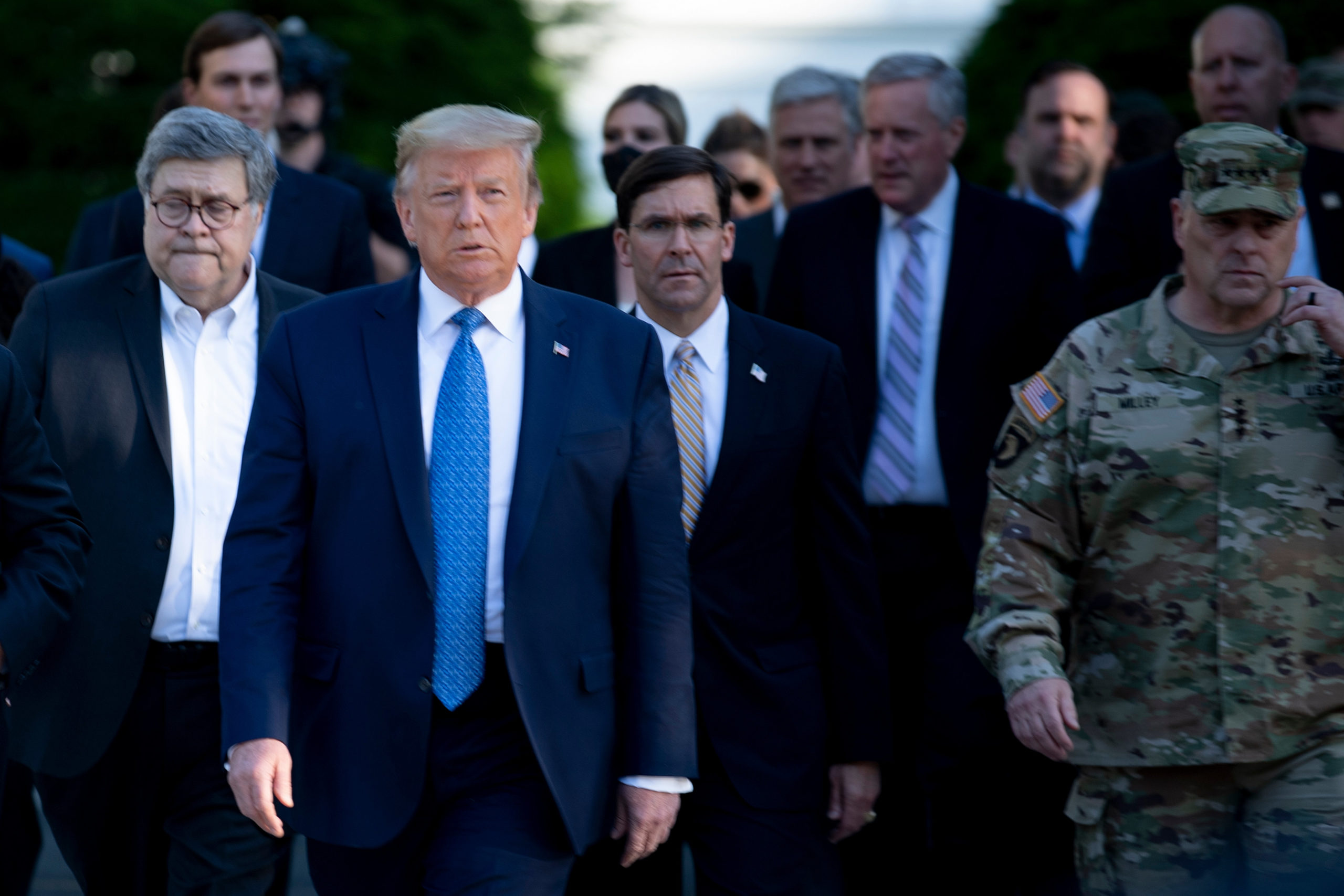 US President Donald Trump walks with US Attorney General William Barr (L), US Secretary of Defence Mark T. Esper (C), Chairman of the Joint Chiefs of Staff Mark A. Milley (R), and others from the White House to visit St. John's Church after the area was cleared of people protesting the death of George Floyd June 1, 2020, in Washington, DC (Photo: Getty Images)