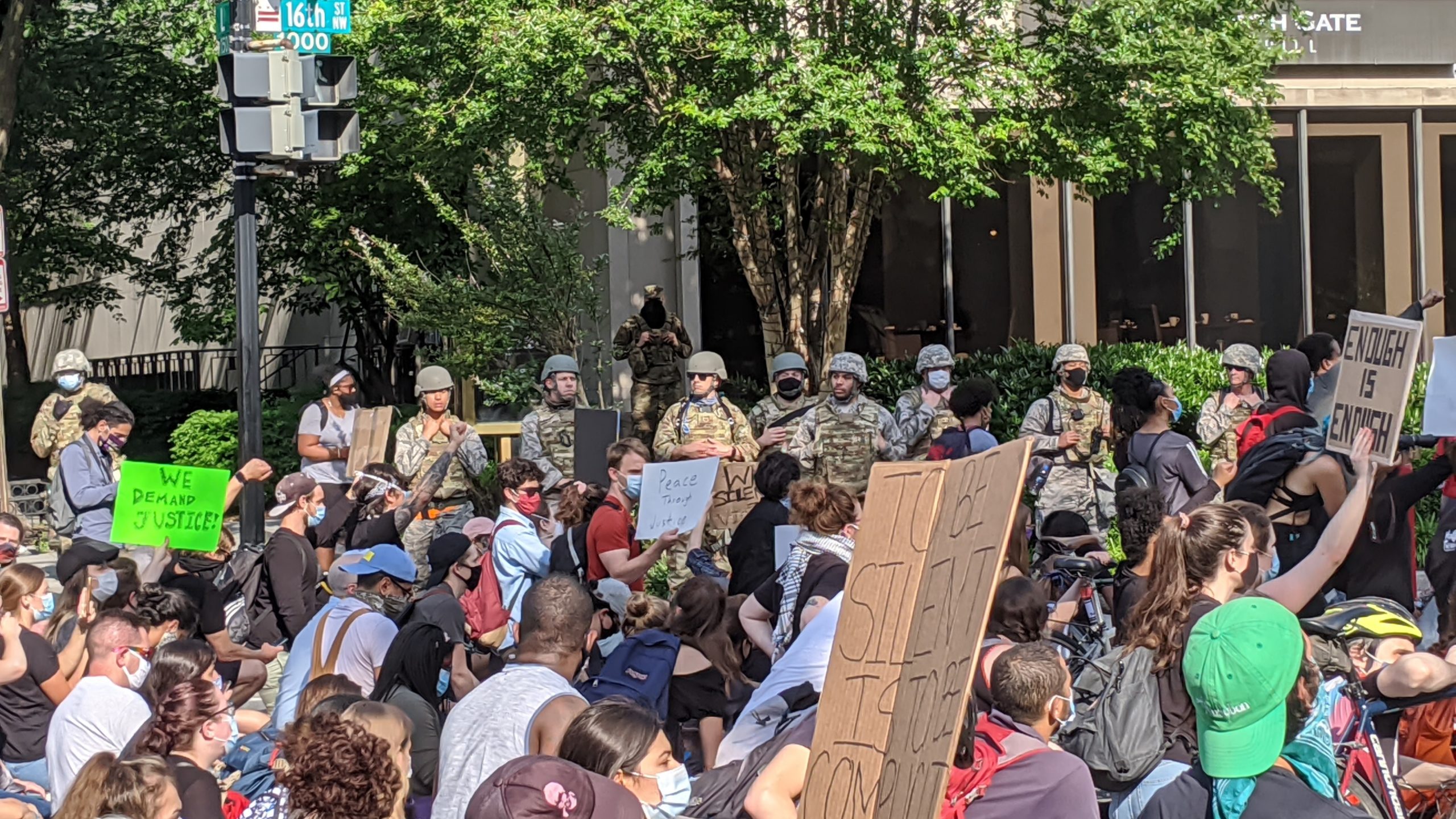 Soldiers observe protesters in D.C., June 2. (Photo: Tom McKay, Gizmodo)