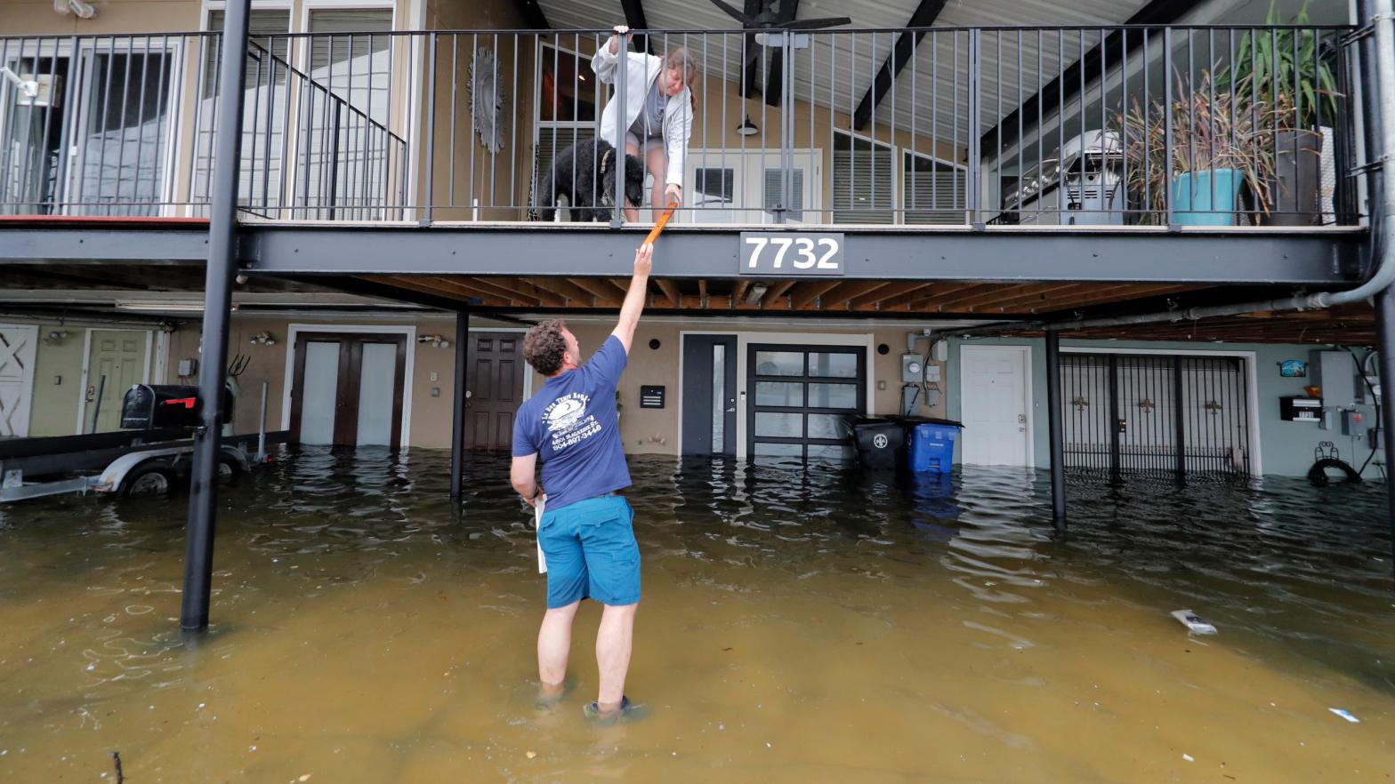 Residents at their home in the West End section of New Orleans (Image: Getty)