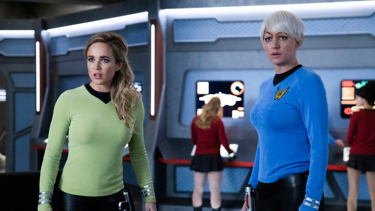 Sara (Caity Lotz) and Ava (Jes Macallan) are trapped on a Star Trek parody TV show. (Photo: Jack Rowand, The CW)
