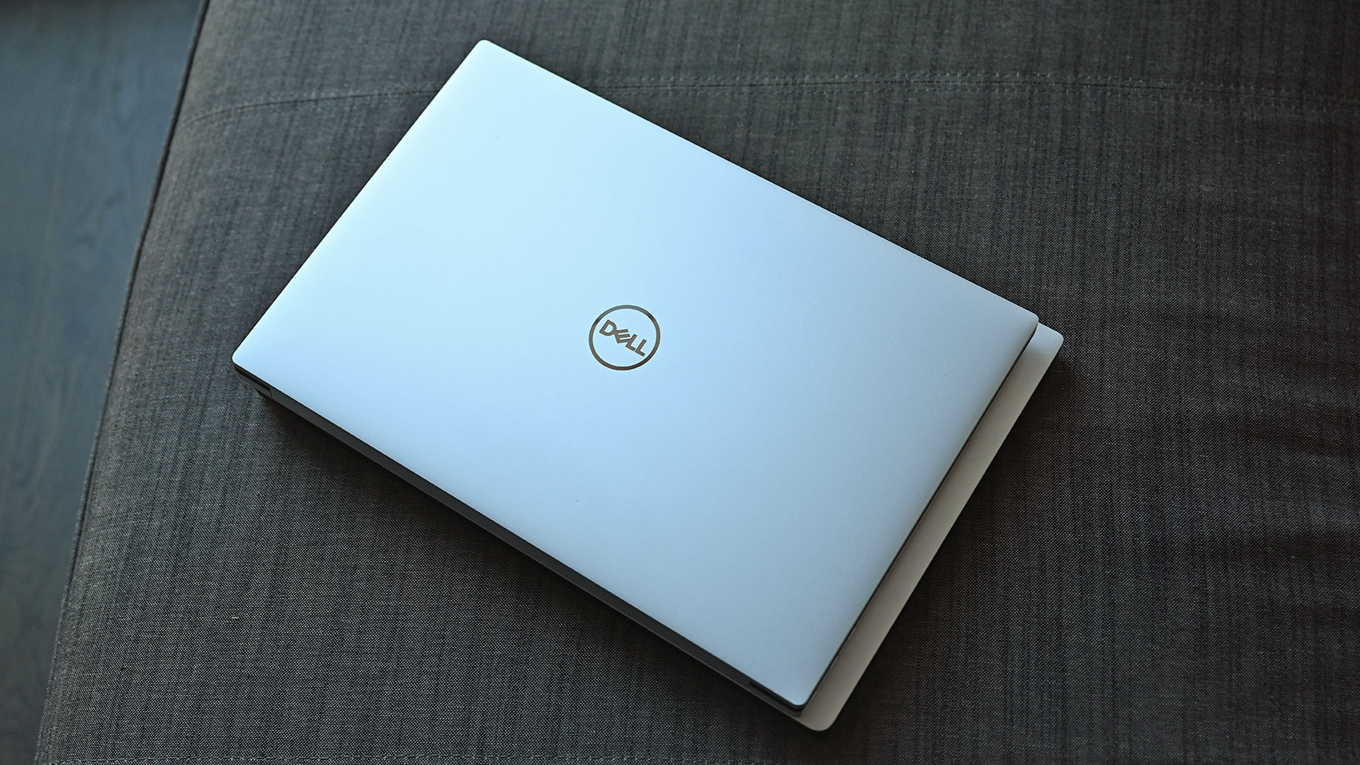 Here's the new XPS 15 sitting on top of last year's model showing much fat Dell trimmed for 2020.  (Photo: Sam Rutherford, Gizmodo)