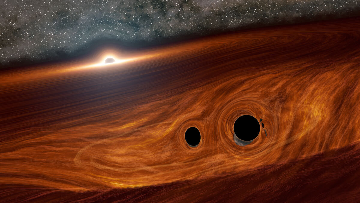 Conceptual image of two black holes on the cusp of merging, situated within the gaseous disk of a nearby supermassive black hole (the bright spot in the background). (Image: R. Hurt/Caltech/Infrared Processing & Analysis Centre)
