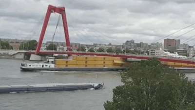 Ship Knocks Containers Into River As It Sails Into Giant Red Bridge You Can’t Miss