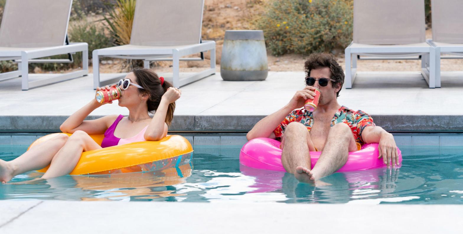 Crack a beer, jump in the pool, and stream Palm Springs this weekend. (Photo: Jessica Perez/Hulu)