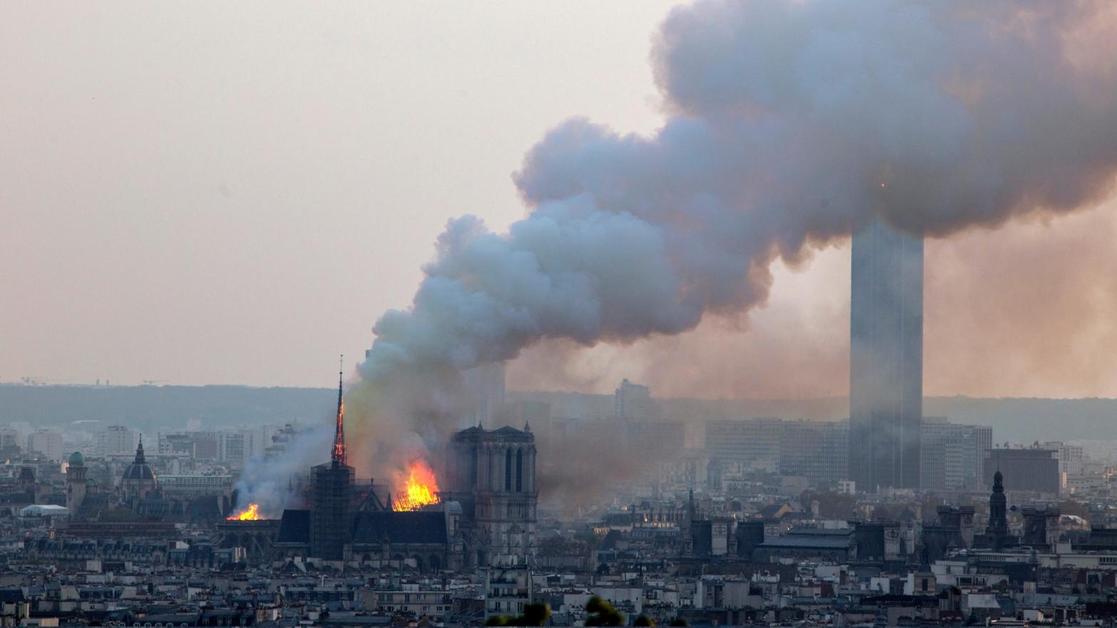 The Notre Dame cathedral burning in Paris on April 15, 2019. (Image: Rafael Yaghobzadeh, AP)