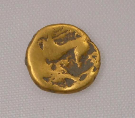 An uninscribed gold stater coin found at the site.  (Image: HS2)