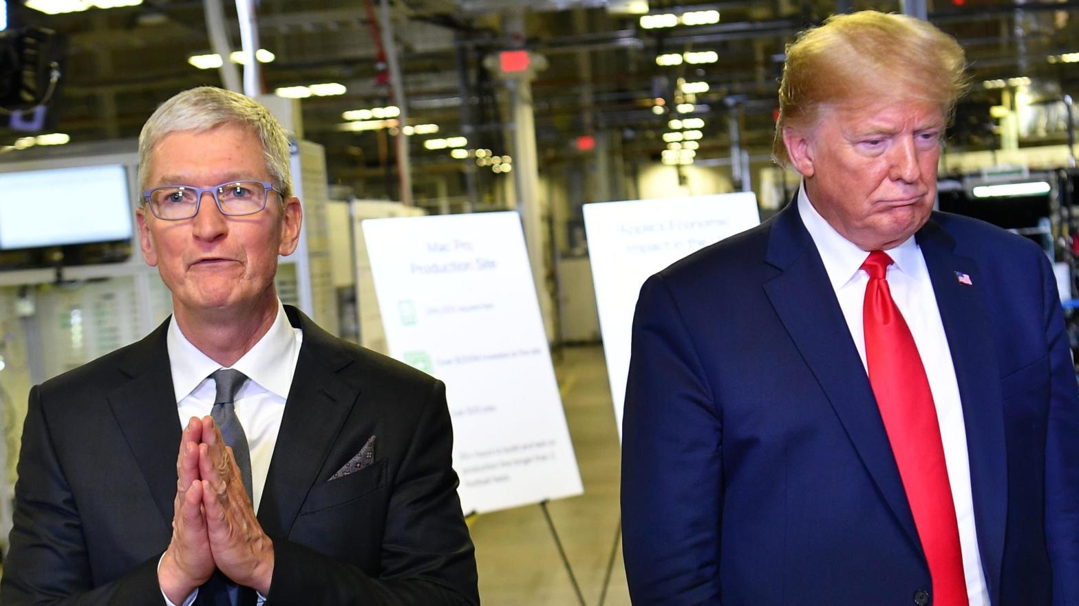 US President Donald Trump (R) and Apple CEO Tim Cook speak to the press during a tour of the Flextronics computer manufacturing facility where Apple's Mac Pros are assembled in Austin, Texas, on November 20, 2019.  (Photo: Mandel Ngan, Getty Images)