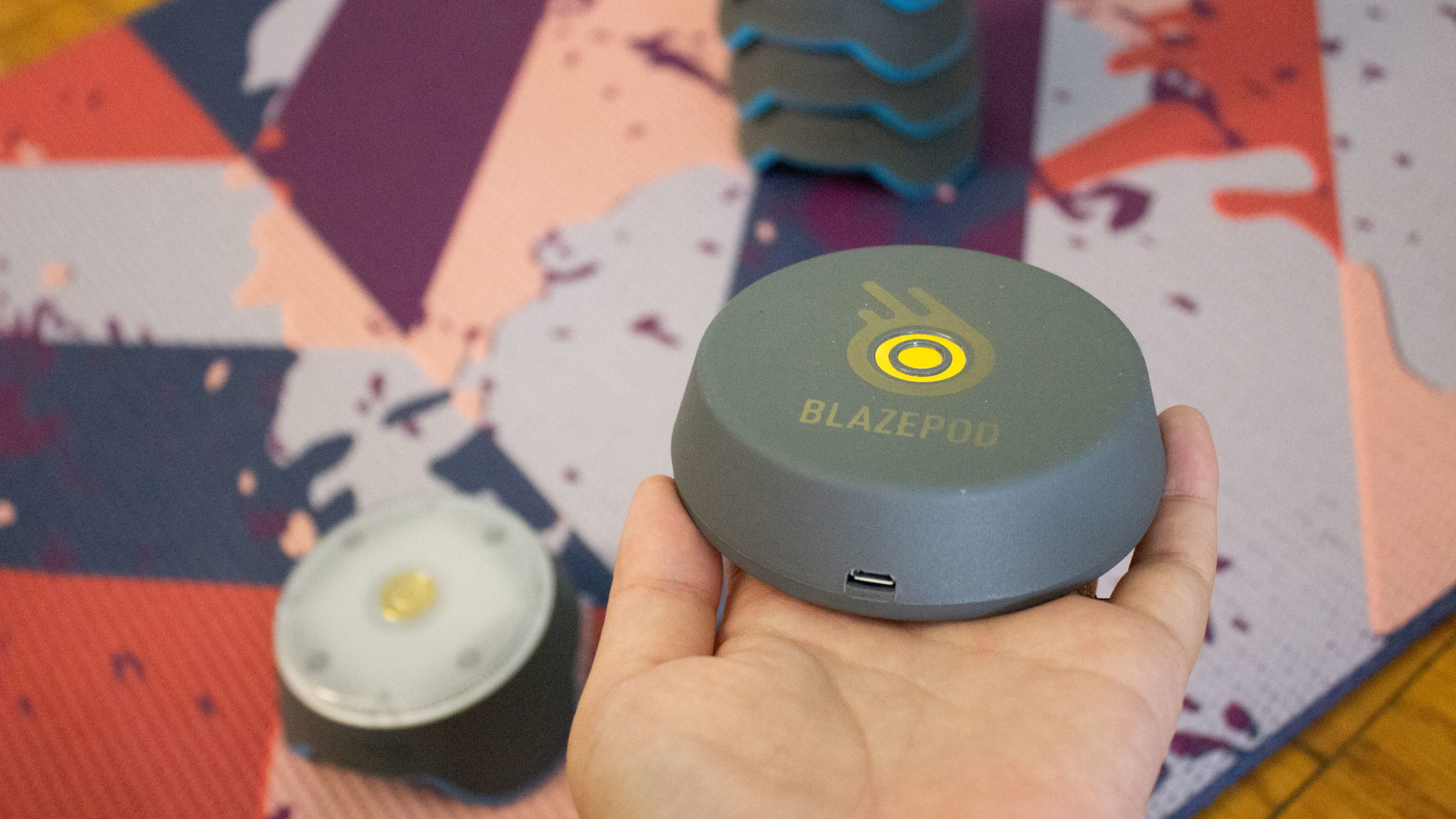 The BlazePod charging base. You stack each pod on top while the base is plugged in via micro USB. (Photo: Victoria Song/Gizmodo)