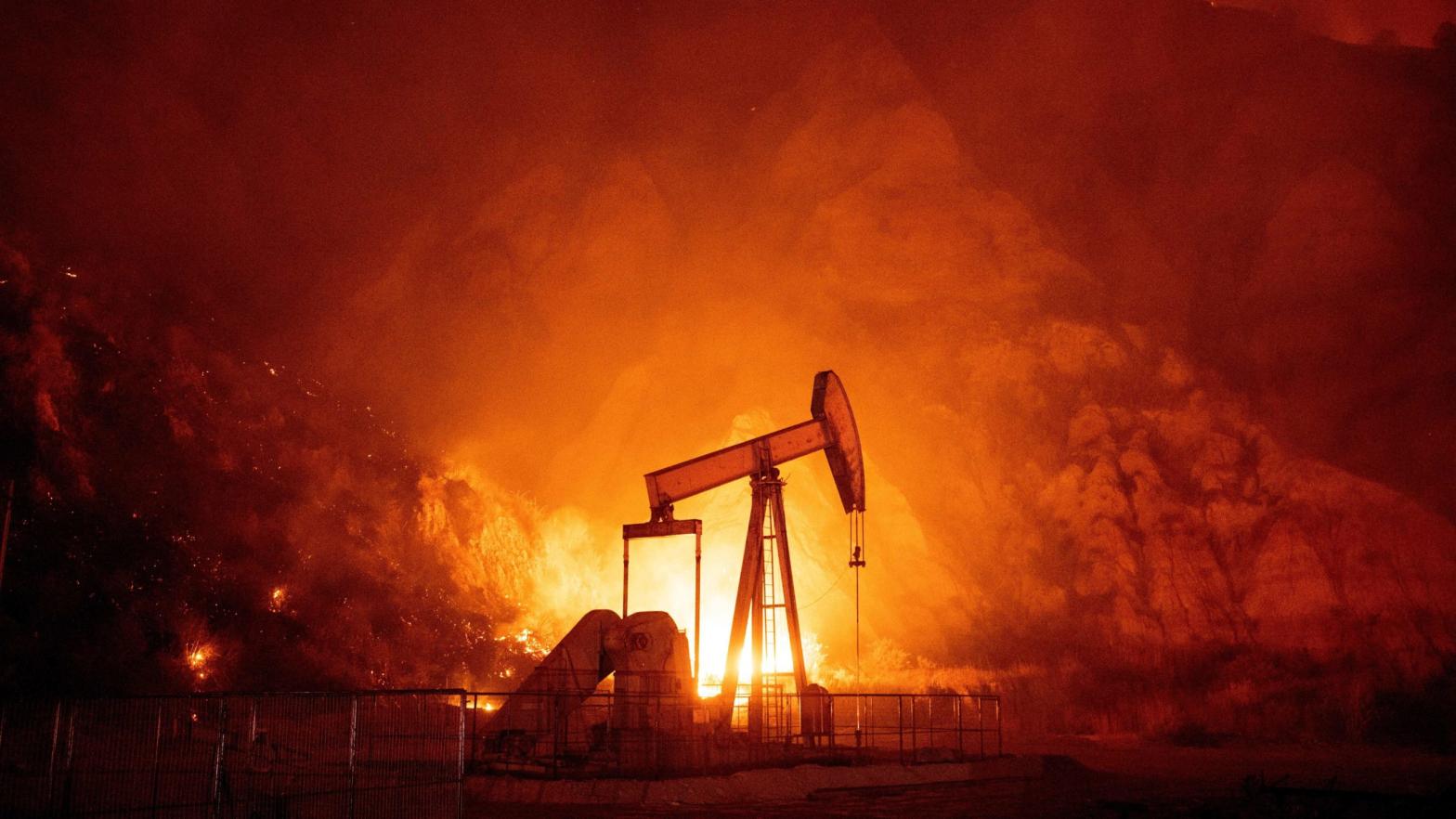Flames from the Maria fire burn through an oil field in Santa Paula, California late on October 31, 2019. (Photo: Josh Edelson/AFP, Getty Images)