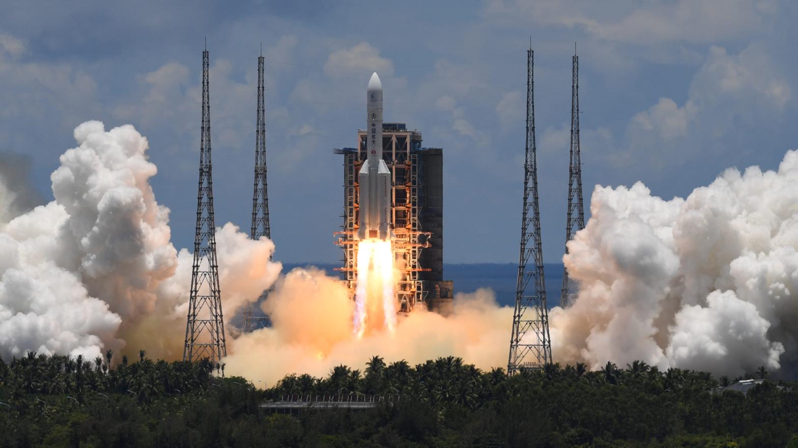 A Long March-5 rocket launches from Wenchang Space Launch Centre in southern China's Hainan Province on July 23, 2020. (Photo: Noah Celis, Getty Images)