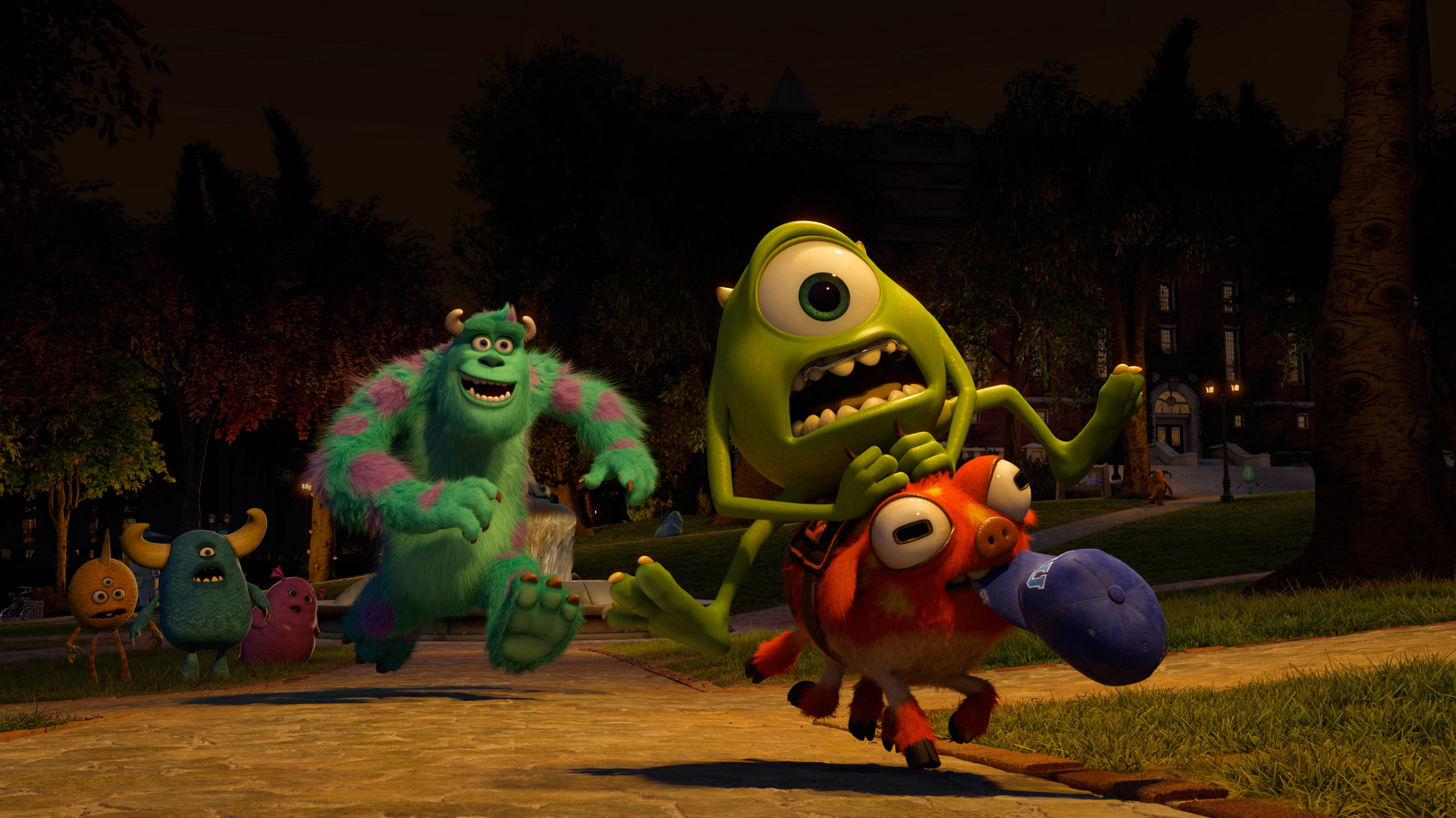 Mike Wazowski might be terrified, but Archie is happy to be along for the ride. (Image: Disney)