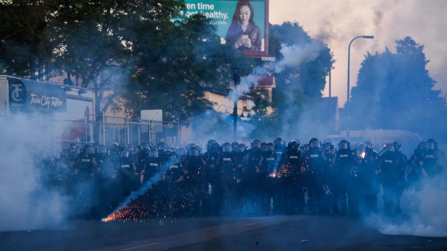 Police launch tear gas and fire rubber bullets toward protesters and the media near near the 5th police precinct during a demonstration to call for justice for George Floyd on May 30 in Minneapolis, Minn. (Photo: Chandan Khanna/AFP, Getty Images)