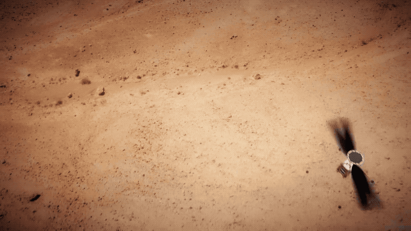 Artistic conception of the Ingenuity helicopter in flight on Mars.  (Gif: NASA/JPL)