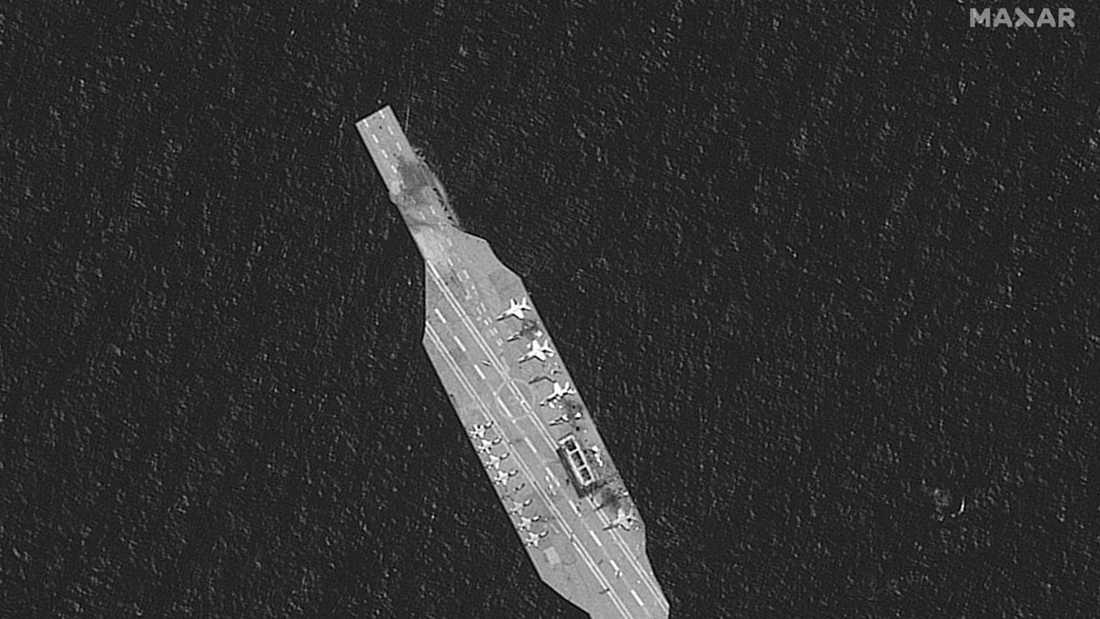 A satellite photo of an Iranian mock-up aircraft carrier damaged by IRGC live-fire exercises in the Strait of Hormuz on July 28, via Maxar Technologies. (Photo: Maxar Technologies, AP)
