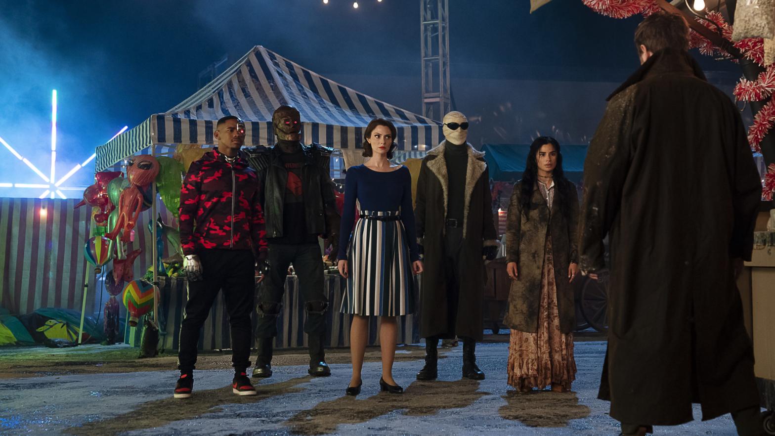 The Doom Patrol arriving at a carnival to fight the Candlemaker. (Image: DC Universe/HBO Max)