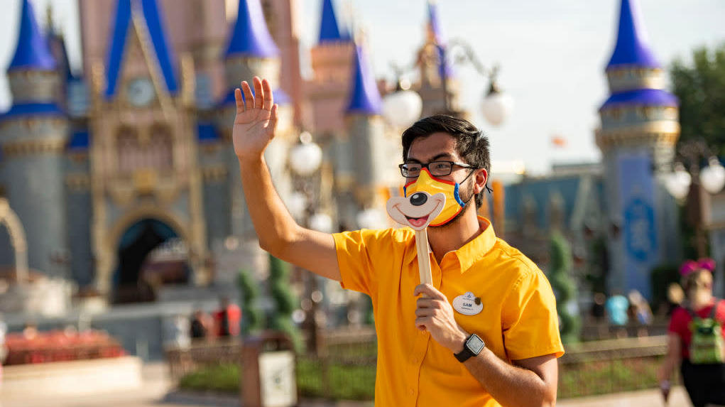 A cast member greets guests during the reopening of Walt Disney World on July 11.  (Photo: Matt Stroshane/Walt Disney World Resort, Getty Images)