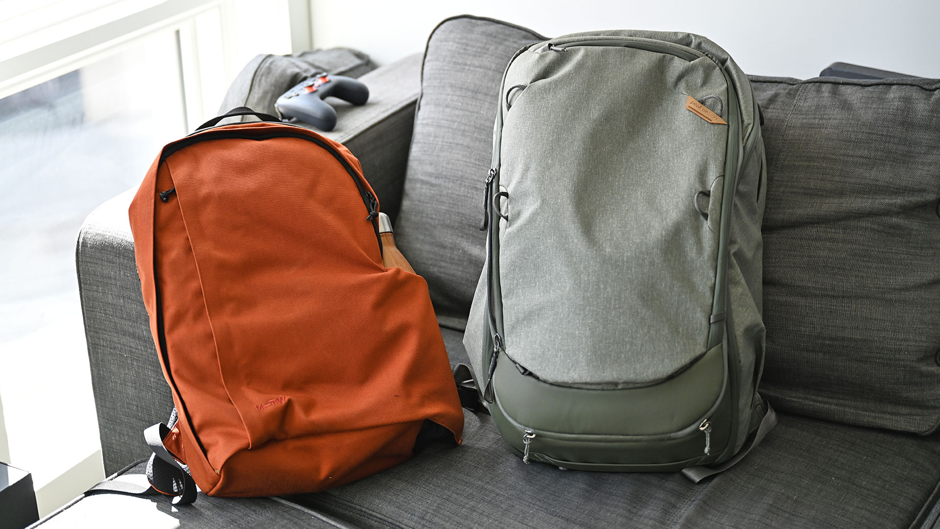 Here is a size comparison of the 21 litre version of the MTW Backpack next to my much larger 45 litre Peak Design Travel Backpack, which I really like, but is a bit too big to use on a daily basis.  (Photo: Sam Rutherford/Gizmodo)