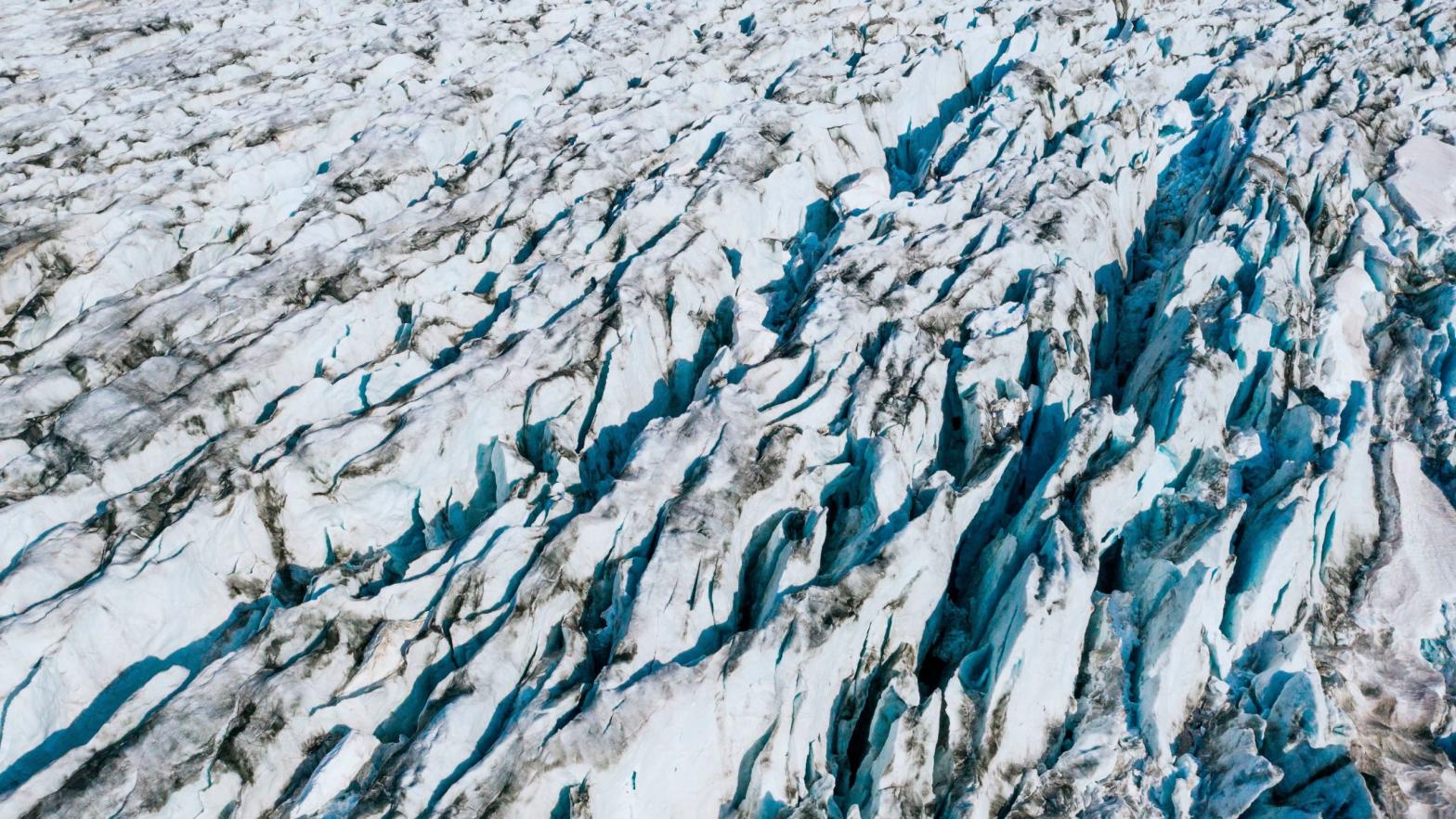 An aerial photo taken in August 2019 shows a view of a Greenland glacier. (Photo: Jonathan Nackstrand, Getty Images)