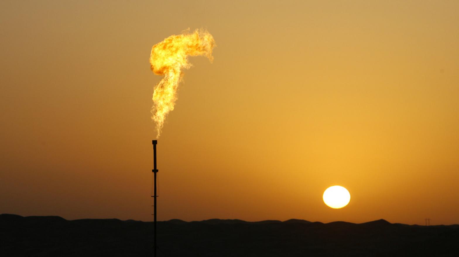 A lonely gas flare as the sun rises. (Photo: Frederic Brown/AFP, Getty Images)