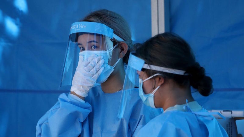 Medical staff wearing protective gear prepare for covid-19 testing at a temporary test facility on August 19, 2020 in Seoul, South Korea. (Photo: Chung Sung-Jun, Getty Images)