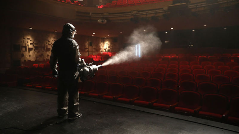 A disinfection worker wearing protective clothing sprays anti-septic solution in an Sejong Culture Centre on July 21, 2020 in Seoul, South Korea. (Photo: Chung Sung-Jun, Getty Images)