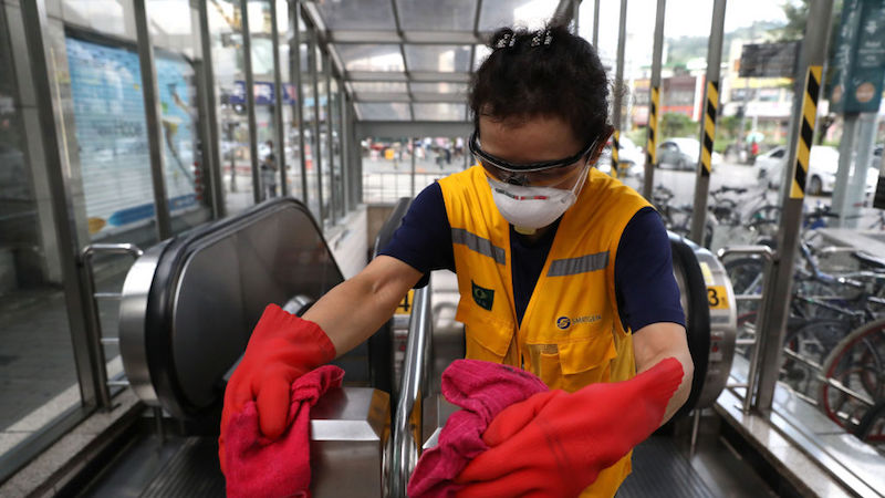 A disinfection worker sprays antiseptic solution at the subway station amid the coronavirus pandemic on August 26, 2020 in Seoul, South Korea. (Photo: Chung Sung-Jun, Getty Images)