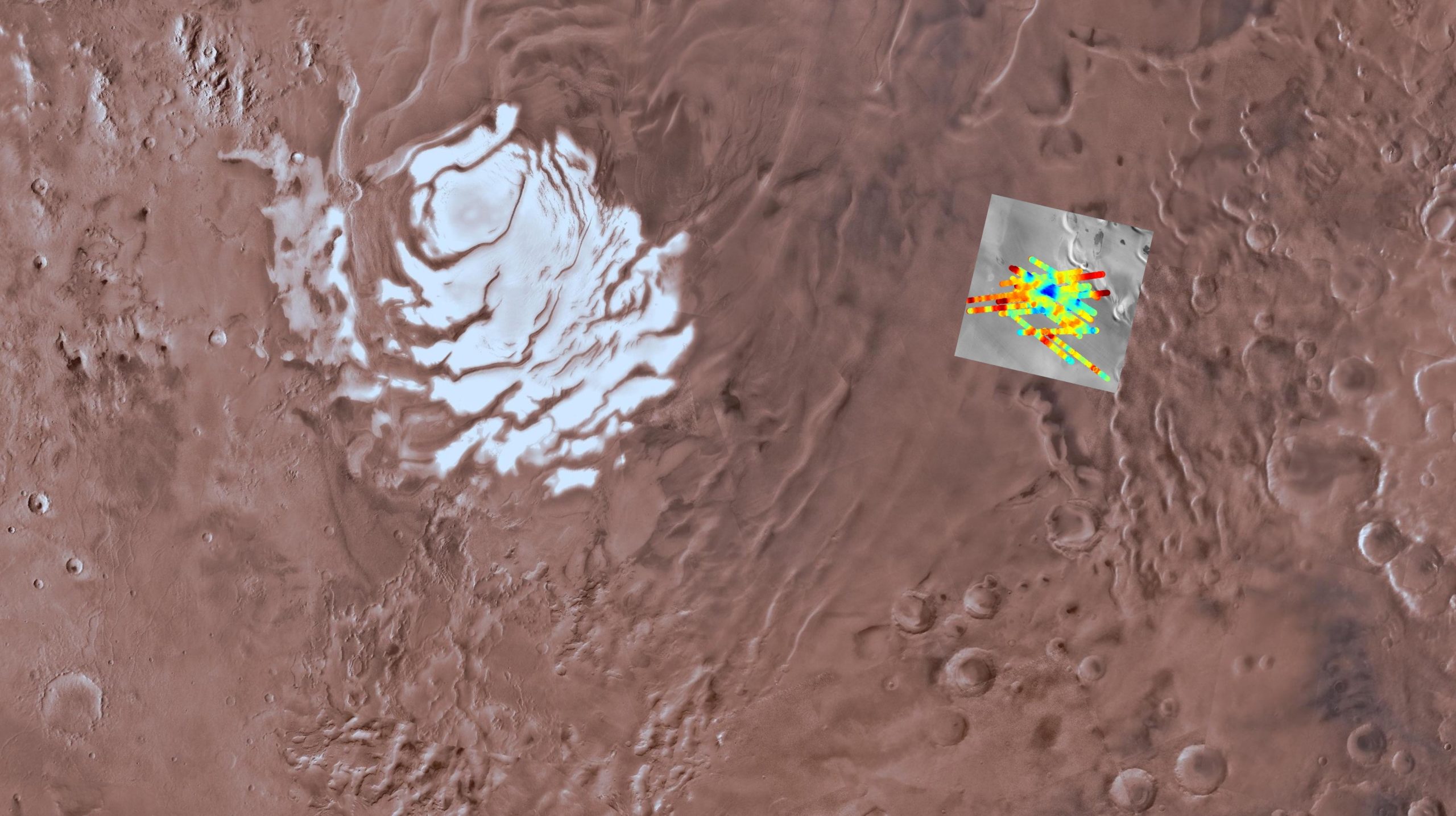 A mosaic image showing the location of a presumed subterranean reservoir, with blue representing liquid water. (Image:  USGS Astrogeology Science Centre, Arizona State University, INAF)