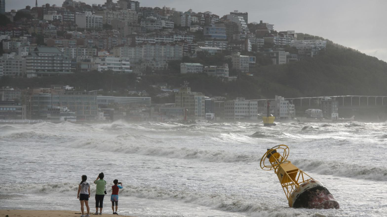 A buoy became that untethered during heavy swell brought by Typhoon Maysak overnight on a beach in Busan on September 3, 2020. (Photo: Ed Jones, Getty Images)