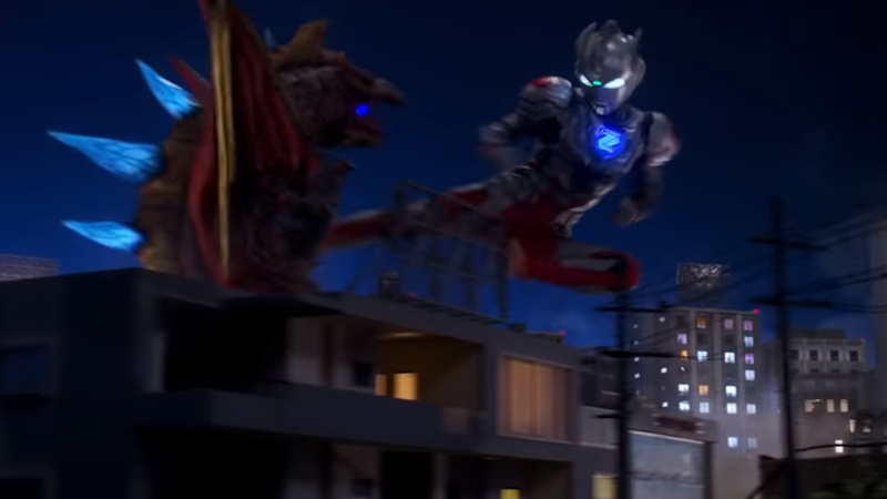 Ultraman Z just punting a giant monster right in the chest. Boss. (Image: Tsuburaya Productions)