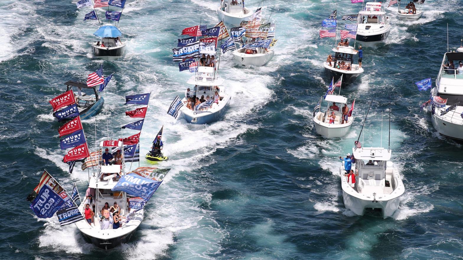 Pro-fascist boaters show their support for President Donald Trump during a parade down the Intracoastal Waterway near Mar-a-Lago on September 7, 2020 in West Palm Beach, Florida. (Photo: Joe Raedle, Getty Images)