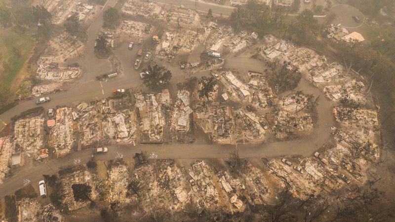 In this aerial view from a drone, damaged homes are seen in a mobile home park that was destroyed by wildfires on September 11, 2020 in Ashland, Oregon. (Photo: David Ryder, Getty Images)