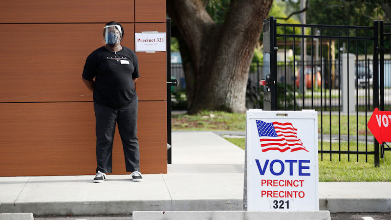 Deputy polling precinct worker Seandra Pinder waits for voters to cast their ballot in Florida's primary election at Precinct 321 on August 18, 2020 in Tampa, Florida. (Photo: Octavio Jones, Getty Images)