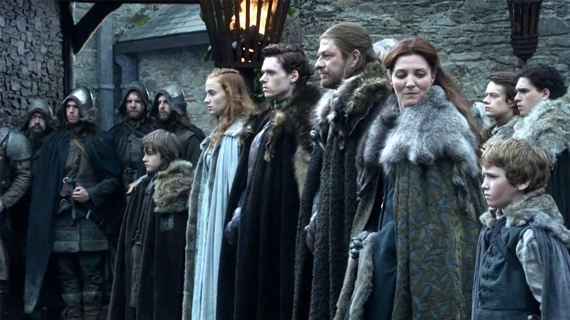The Stark family, who almost apparently met some people with very unfortunate haircuts, in Game of Thrones' first episode. (Image: HBO)