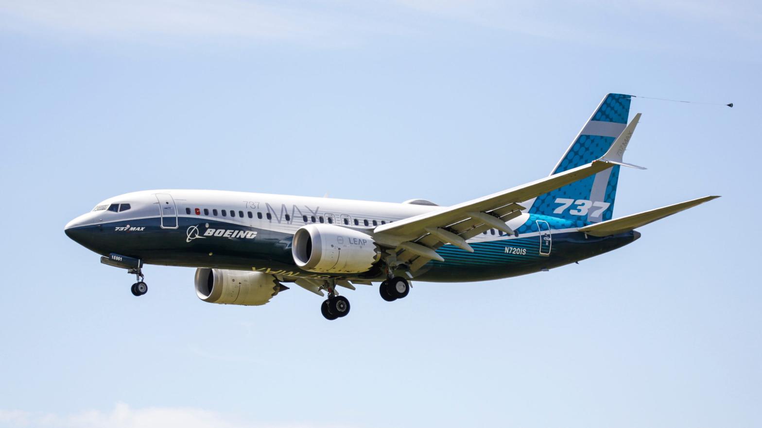 A Boeing 737 MAX jet comes in for a landing following a Federal Aviation Administration (FAA) test flight at Boeing Field in Seattle, Washington on June 29, 2020. (Photo: Jason Redmond, Getty Images)