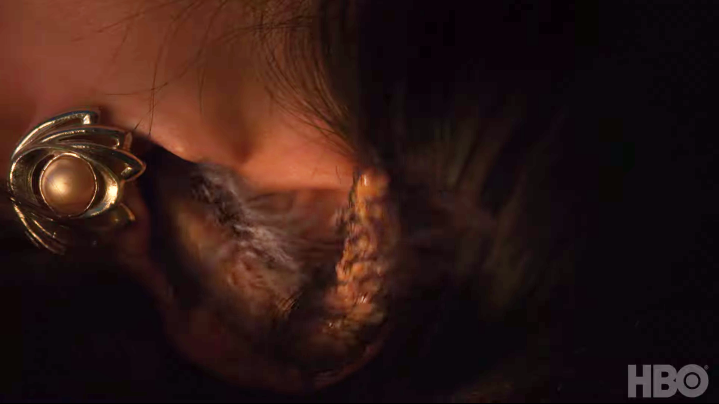Ji-Ah's foxtail emerging from her ear. (Screenshot: HBO)