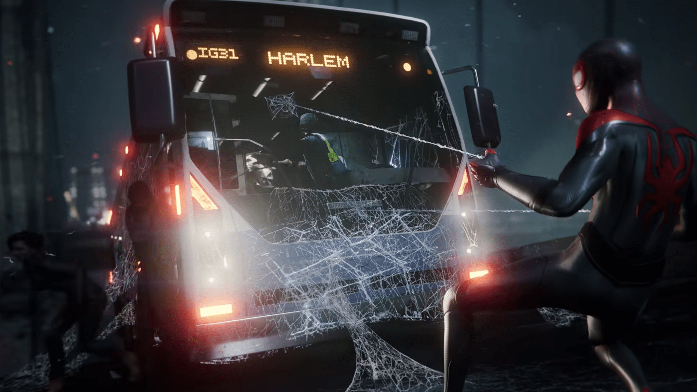 Miles holding a bus up with his webbing while civilians escape. (Screenshot: Insomniac)