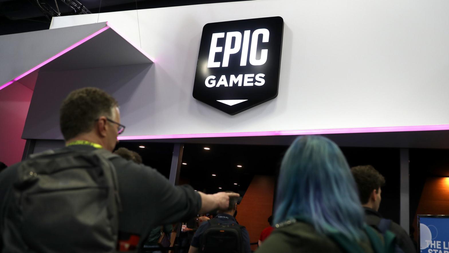 Attendees walk by the Epic Games booth at the 2019 GDC Game Developers Conference on March 20, 2019 in San Francisco, California. (Photo: Justin Sullivan, Getty Images)
