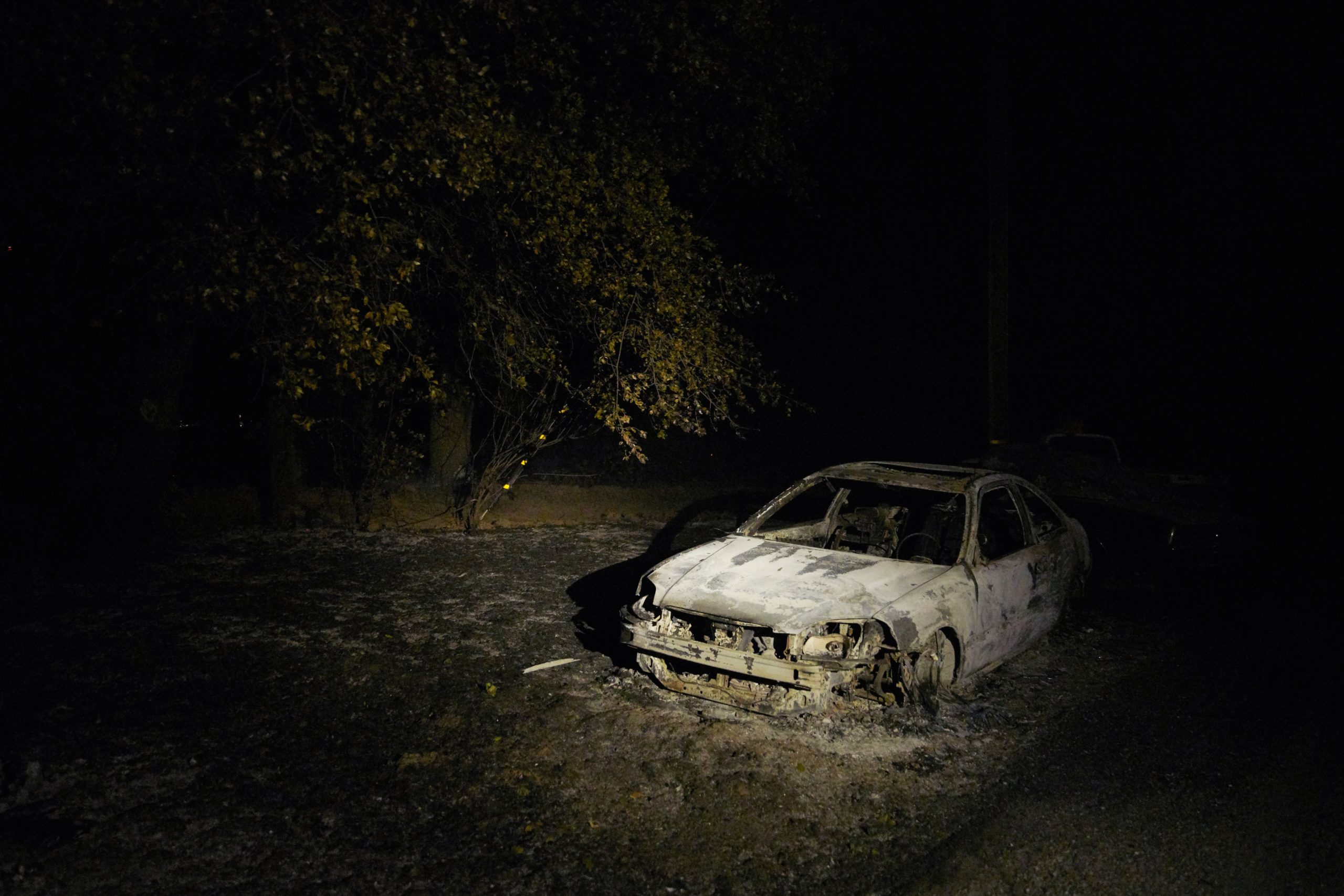 A photo shows a destroyed car from the Zogg fire, in Igo on September 27, 2020 (Photo: Allison Dinner, Getty Images)