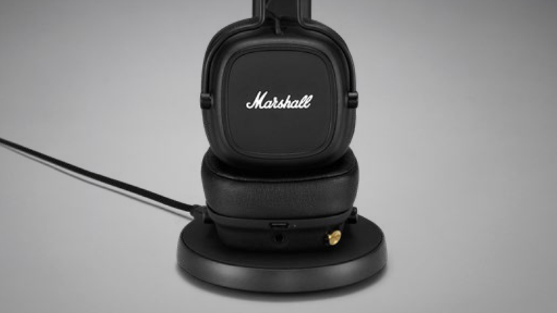 It might be a bit of a balancing act, but the Marshall Major IVs can be perched and charged on a Qi-compatible wireless charging pad. (Image: Marshall)